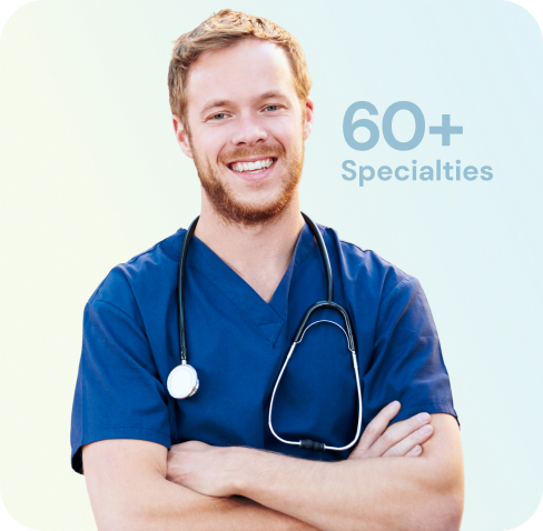 A smiling healthcare professional in blue scrubs with a stethoscope, arms crossed. Background text reads "60+ Specialties," conveying trust and expertise.